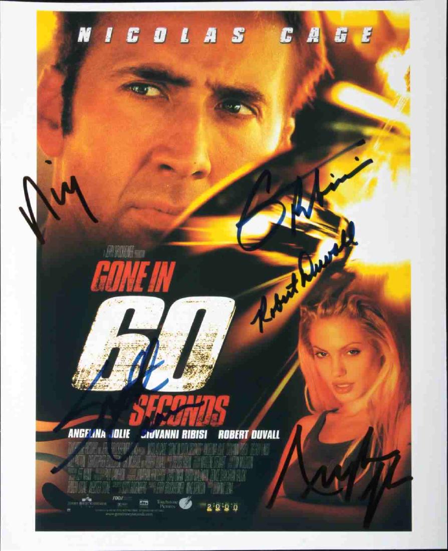GONE IN 60 SECONDS AUTOGRAPHED MOVIE COVER W COA: Gone in 60 Seconds movie cover. Autographed by Angelina Jolie, Nicholas Cage, Giovanni Ribishi, Robert Duvall, and Scott Caan. VG condition. Measures 8" x 10 1/4". Certificate of Authenticity included
