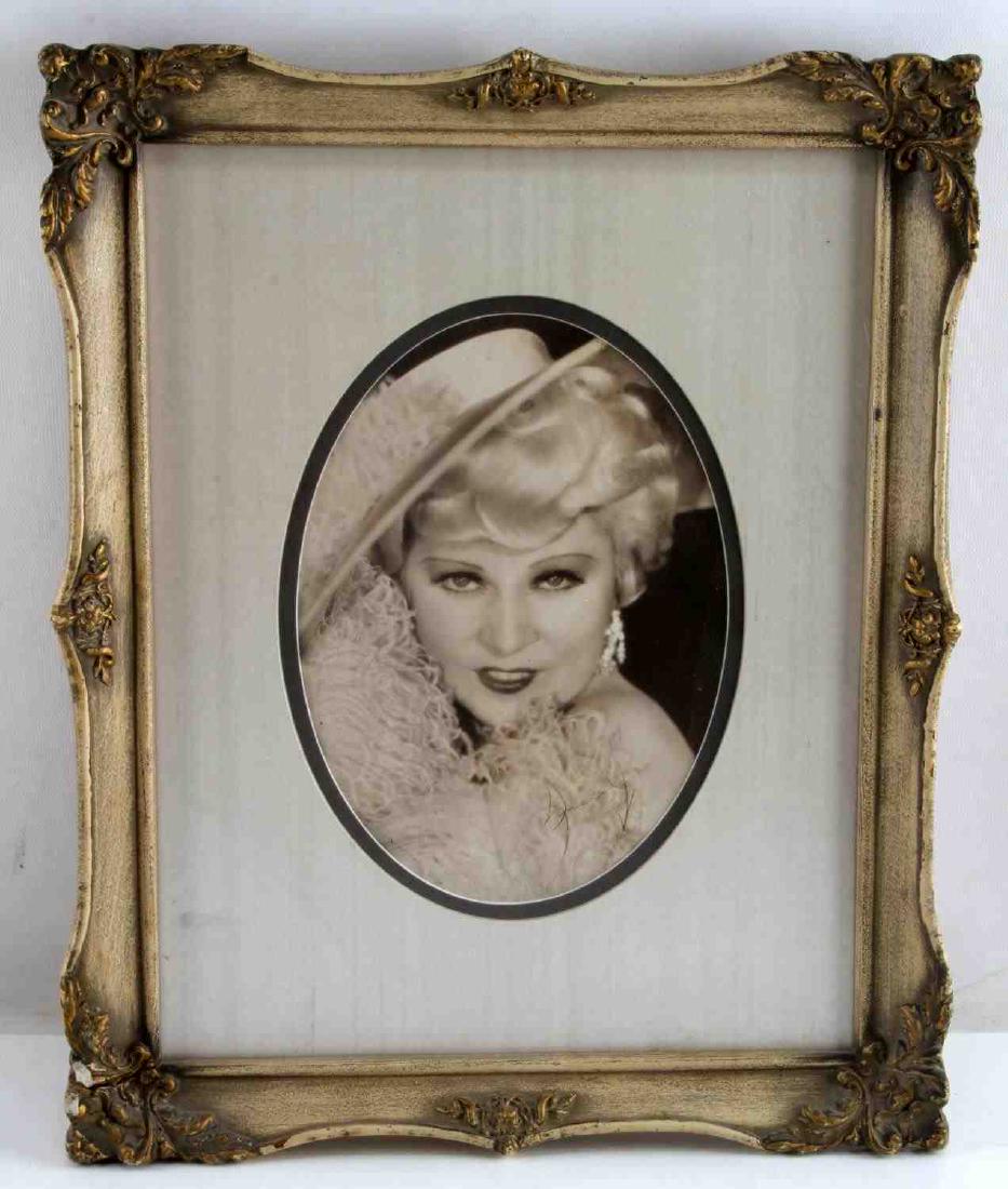 MAE WEST AUTOGRAPHED PHOTO WITH COA: COA from Historical Preservations Jonesboro Georgia. Signed lower right corner . Framed measurements: 16 by 13 inches. In good condition.
