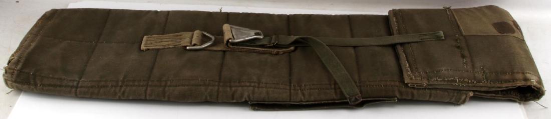 US WWII PARATROOPER M1 GARAND RIFLE JUMP BAG: U.S. WWII paratrooper M1 Garand rifle jump bag. Measures 48" in length. Markings are faded. VG condition.