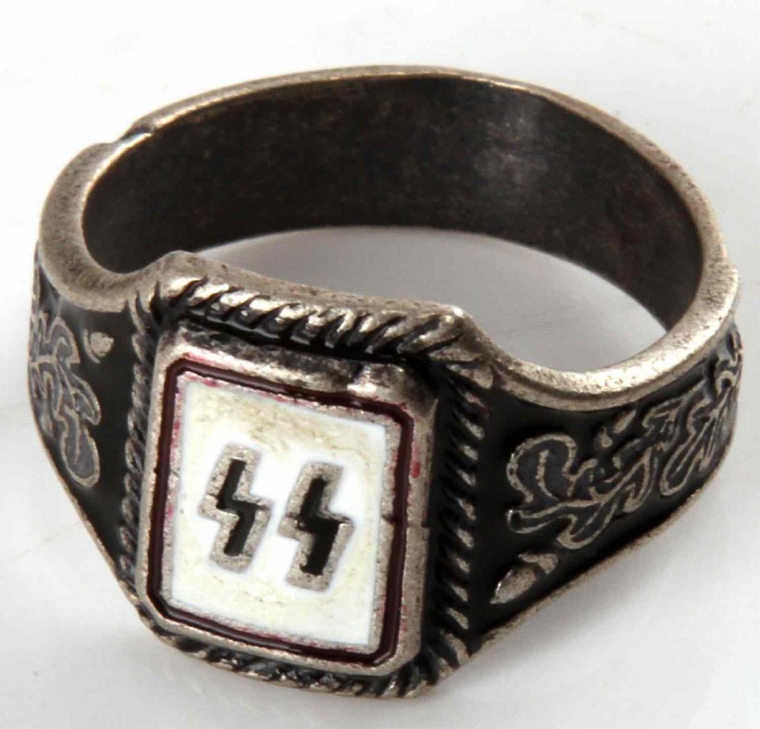 WWII GERMAN THIRD REICH WAFFEN SS SILVER RING: Silver ring with SS sig runes in a crest, black and white enameling. '800' Silver mark. In good condition overall. Unauthenticated/Sold 'as is'. This lot has a reserve.