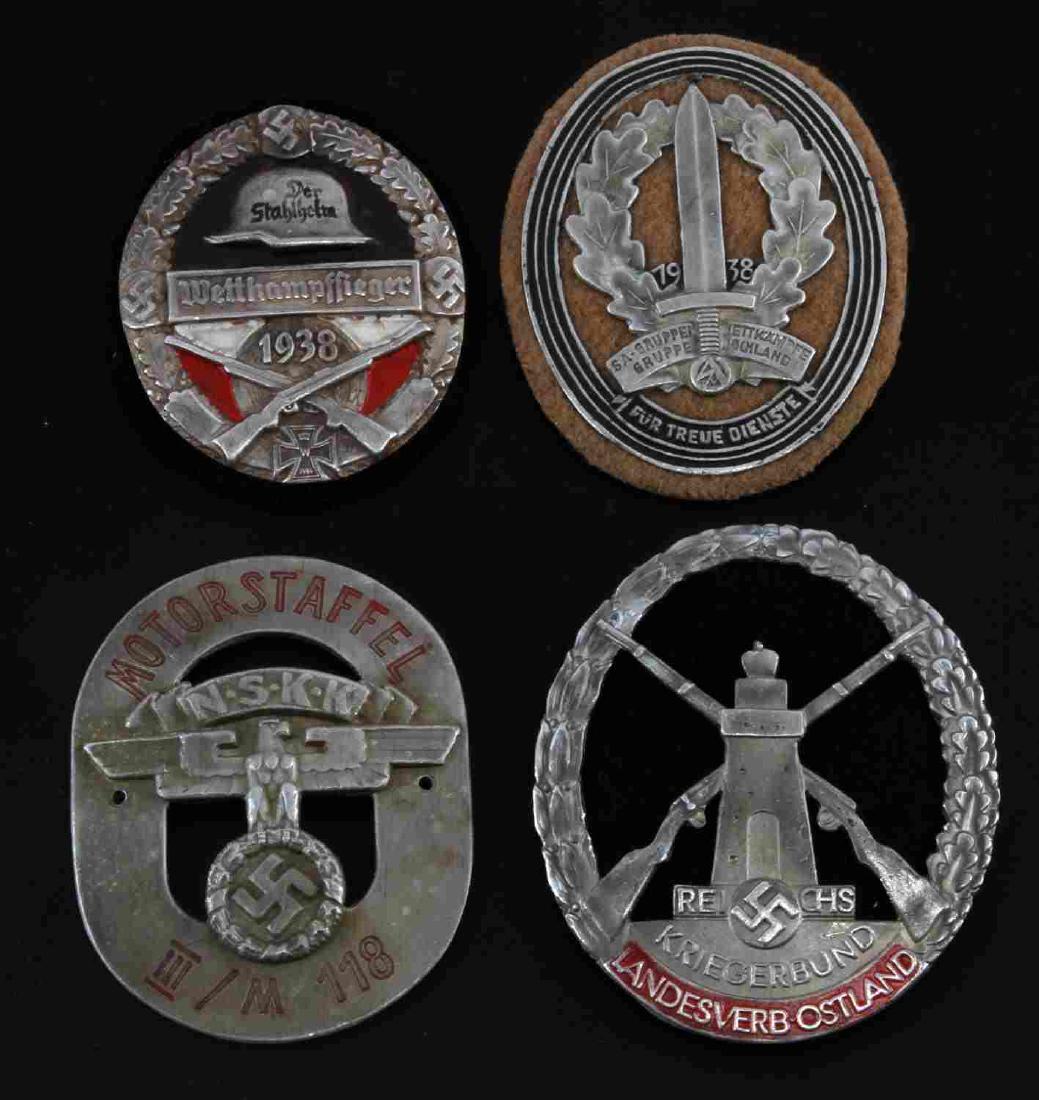 4 GERMAN WWII THIRD REICH SLEEVE SHIELD LOT: Includes 1938 Stahlhelm competition of pilots, NSKK Motorstaffel, Reich Military Federation, and 1938 SA Gruppe Hochland. Some wear and discoloring present; overall in very good condition. Unauthentic