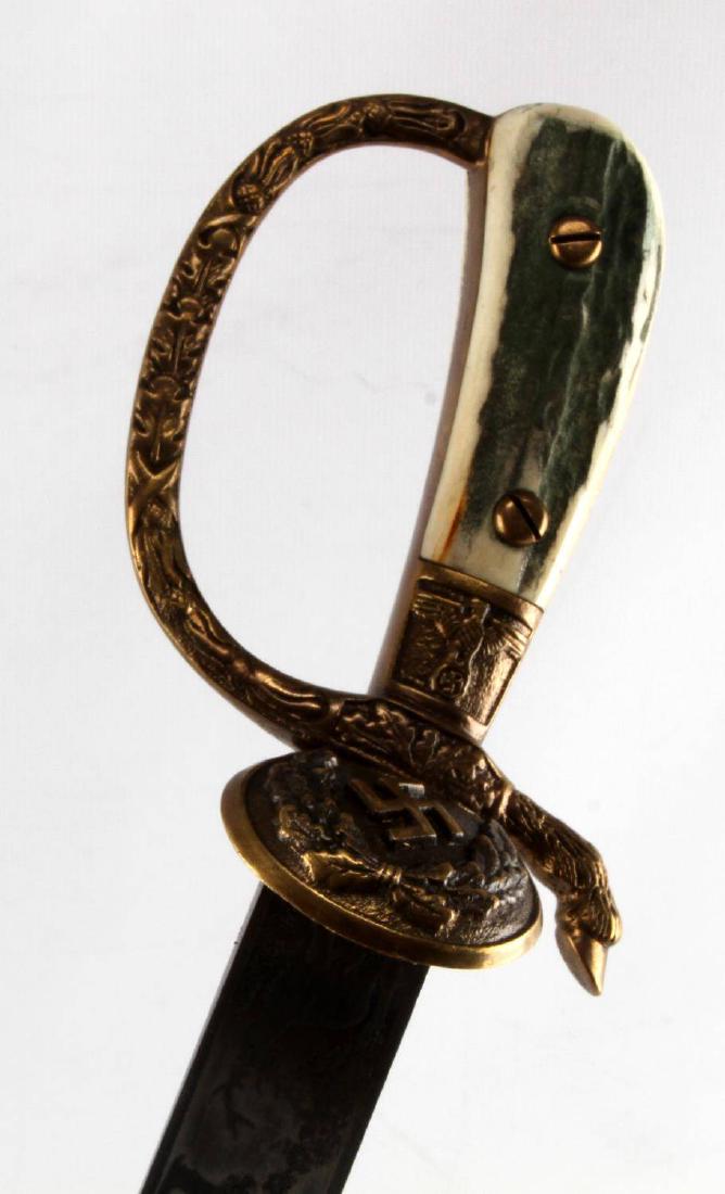 GERMAN THIRD REICH HUNTING KNIFE W SKINNING KNIFE: German Third Reich hunting set. Includes main knife with swastika insignia guard, skinning knife, and leather/brass scabbard. 13" blade displays maker marking of "Weyersberg & Co. Solingen" as well as