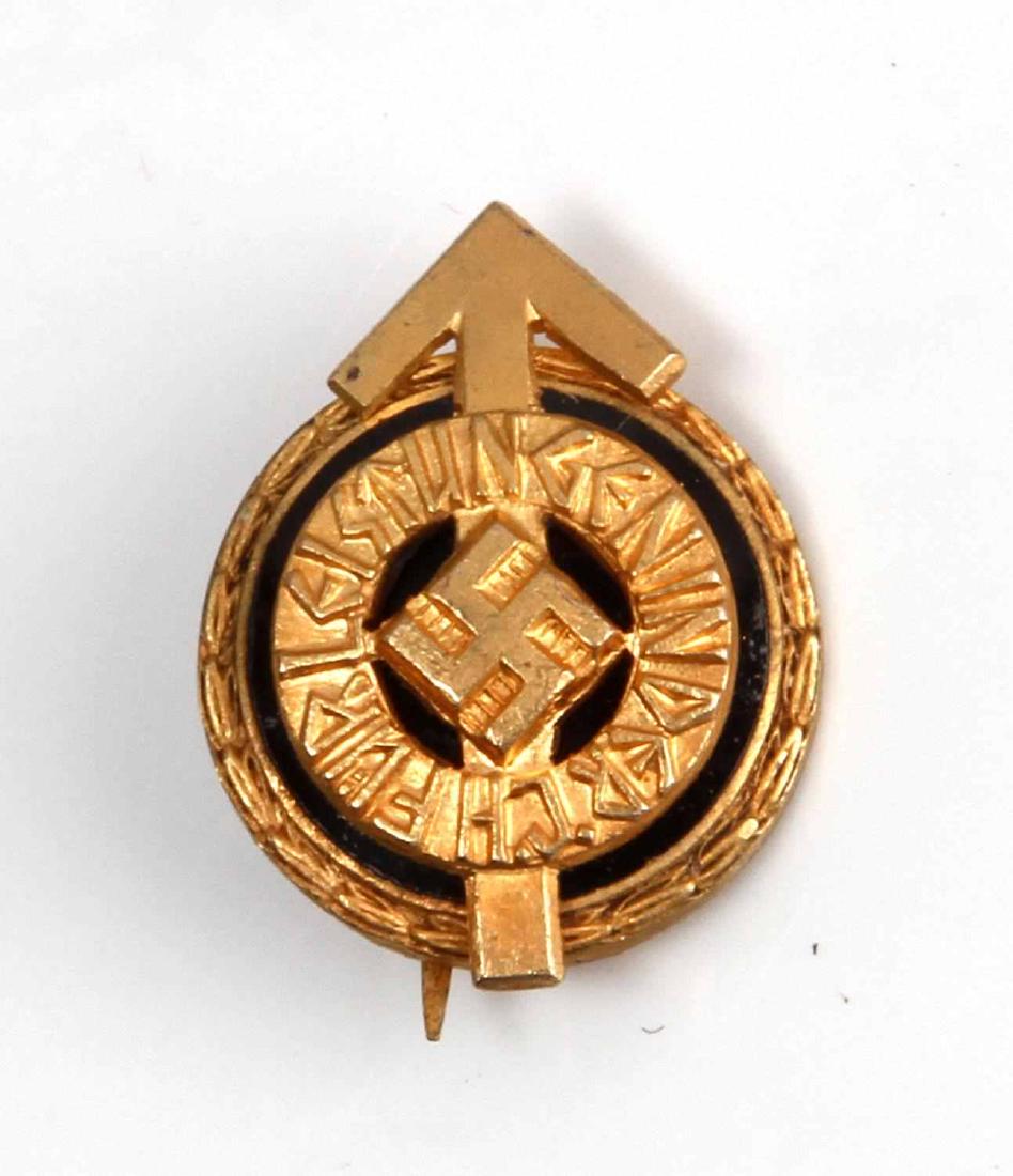 GERMAN WWII MINI HITLER YOUTH GOLDEN LEADER BADGE: Minature sports badge measures 2cm at widest point. Reverse marked RZM M1/101, two piece brass construction with enamel. In good condition. Unauthenticated sold as is.