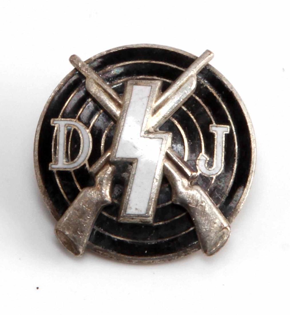 GERMAN WWII DEUTSCHES YOUTH SHOOTING AWARD: Youth DJ Marksman award measures 2.3cm in diameter, reverse marked RZM M1/123, two piece nickel construction with enamel intact and showing some contact wear. Unauthenticated sold as is
