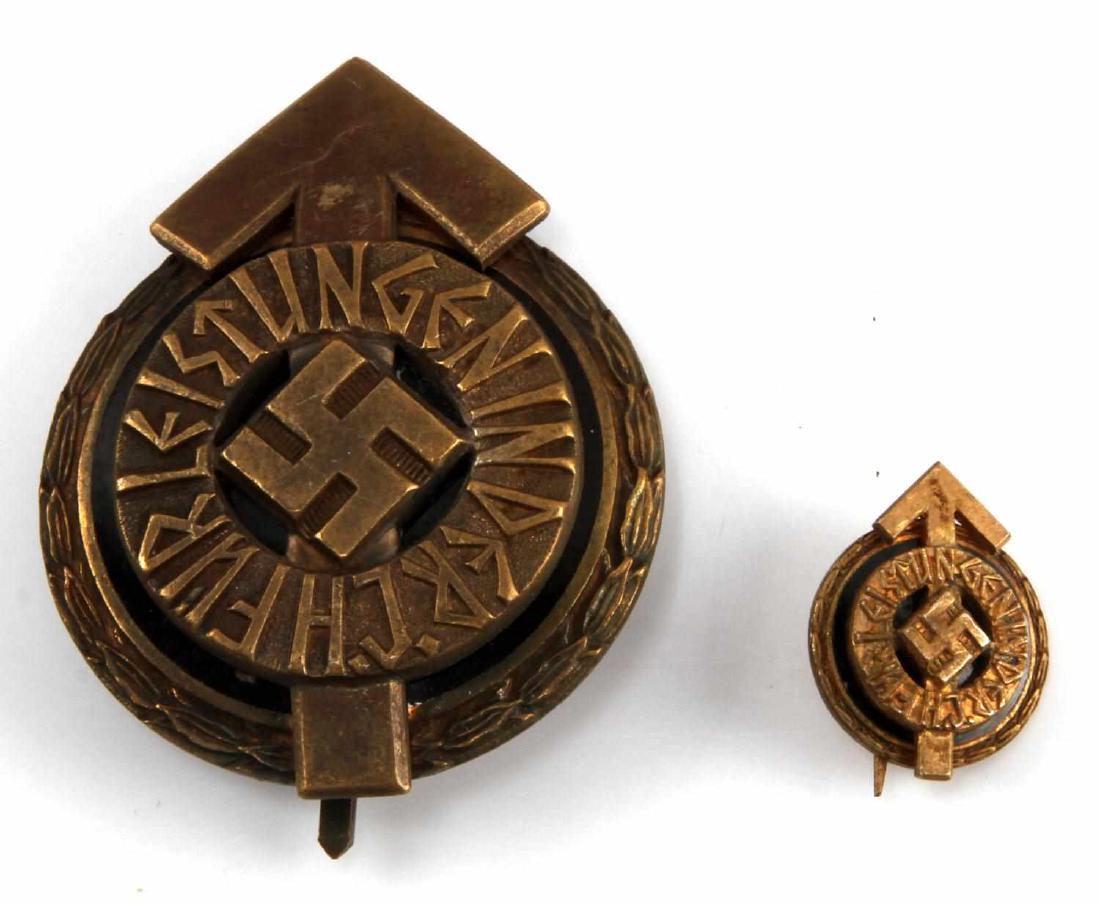 WWII GERMAN THIRD REICH HITLER YOUTH LEADER BADGE: 2 Sports badge In very good condition. They are 2 piece construction.1 is 1 inch in diameter the other is 2 inches. The larger is RZM marked and 4373. The smaller is RZM and M1/ 101 marked. Unauthenti