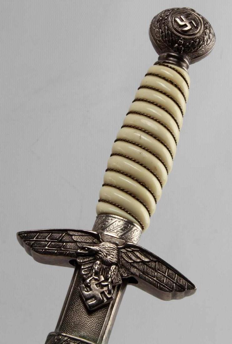 WWII GERMAN THIRD REICH LUFTWAFFE OFFICER DAGGER: 2nd model dagger with scabbard and 1 suspension ring. Measures 17 inches long over all. Double engraved. Maker marked Alcoso Solingen ACS and has their weights and measure logo. The handle is wire wra