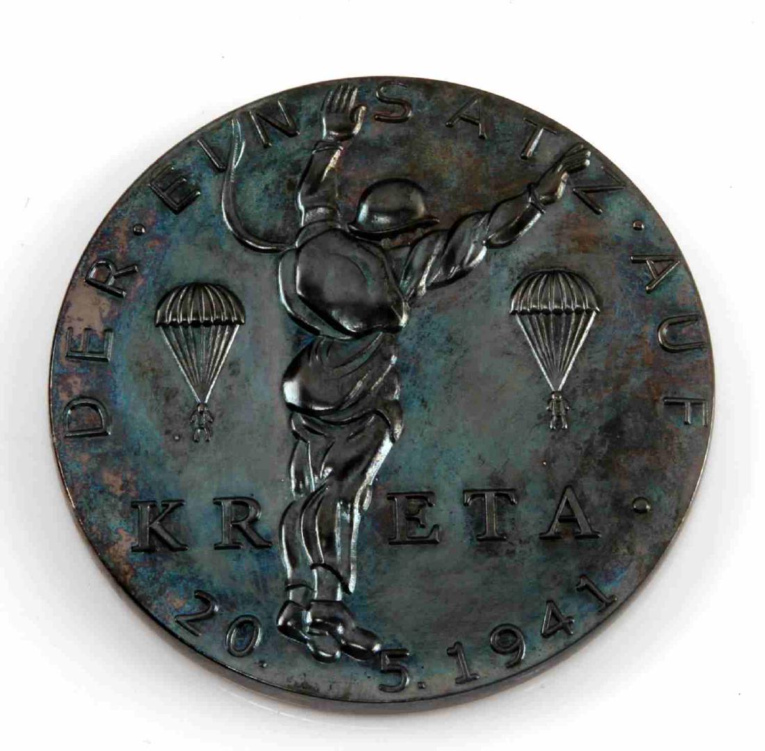 GERMAN WWII LUFTWAFFE PARA KRETA TABLE AWARD: Luftwaffe Paratrooper Fallschirmjager 1941 KRETA Table Award. 3 3 /16 inch diameter. This is the black 3rd class award. Unauthenticated. Sold "as is".