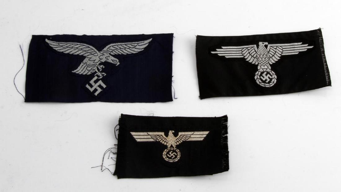 GERMAN WWII ARMY PANZER EM & OFFICERS CAP EAGLES: 1 is bevo cloth embroidered and the other is flat silver bullion wire. Included is a Waffen SS enlisted mans arm eagle & a Luftwaffe EM breast eagle. Overall in very good condition. Unauthenticated, s