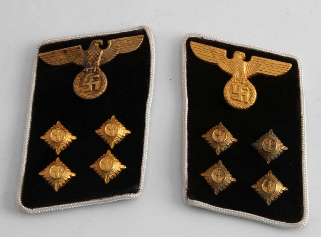WWII GERMAN 3RD REICH POLITICAL LEADER COLLAR TABS: Collar tabs of an NSDAP gemeinschaftsleiter. They measure 1 7/8 inches wide by 2 3/4 inches long. Each has an aluminum eagle and four aluminum pips. One tab has an 'RZM SA' paper tag on the reverse. T