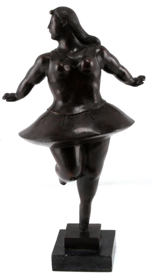 BALLERINA BRONZE IN THE STYLE OF BOTERO: This Ballerina with exaggerated proportions is in the Botero style has a rich patina and stands, on a marble base, weighs 10 lbs. and has a total height of 17 inches. Unsigned. Fernando Botero (born A