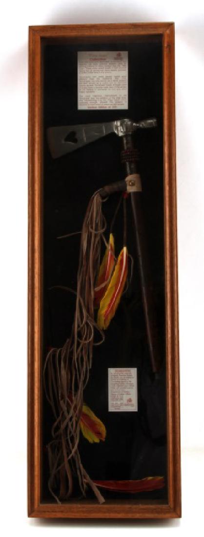 NATIVE AMERICAN CHEROKEE NATION TOMAHAWK PIPE: Framed limited edition from the "Pipe Hawk" collection. Measures 18 inches long and is 33 inches by 10 inches in frame. Made by Cherokee artist Jeff "Blue water". Has had one owner since 8/25/93 when 