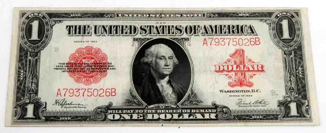1923 $1 LARGE SIZE LEGAL TENDER RED SEAL NOTE AU: In almost uncirculated condition. One crease runs down the center. Colors are very bright and paper is crisp. No pinholes. Well centered. Speelman-White signatures. S/N A79375026B. FR-40