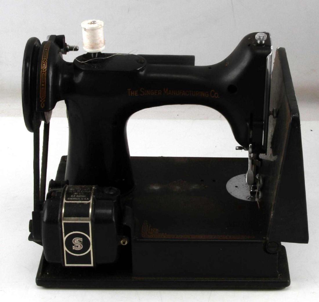 PORTABLE SINGER SEWING MACHINE FEATHERWEIGHT 221: Includes case, instructions and accessories. Fabric on case is separated in areas. There is some enamel, paint or finish loss throughout please review photos for condition. Appears to be intact but un