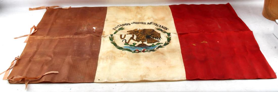 ANTIQUE UNITED STATES OF MEXICO FLAG VARIANT: Variant flag of the United States of Mexico. Appears to be of antique construction. Has nation's name written above the crest. In good condition with some small wear holes on the flag, and strong fadi
