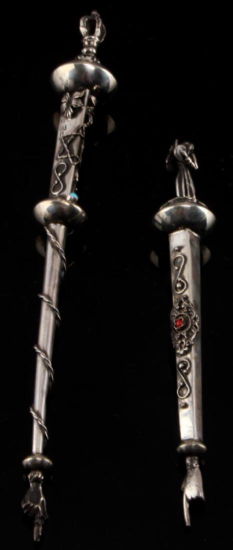 2 RUSSIAN JUDAIC SILVER YAD TORAH POINTERS 1873: Hallmarked Russian silver Yad Torah pointers. Both fully decorated in relief, Star of David, finial to top. Measures 6.5 and 9.5 inches long. (B. C. 1873 84) marked silver. Very good condition. Unauth