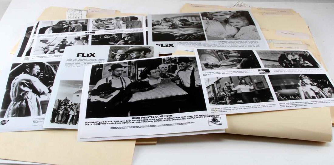 LARGE GROUPING OF PRESS PHOTOS ACTORS ARTISTS: 100+ press photographs. Includes Nuns On The Run, The Nutcracker, The Nutty Professor, The Odd Couple, Odd Jobs, An Officer and a Gentleman, and many more. Overall in very good condition with minor be