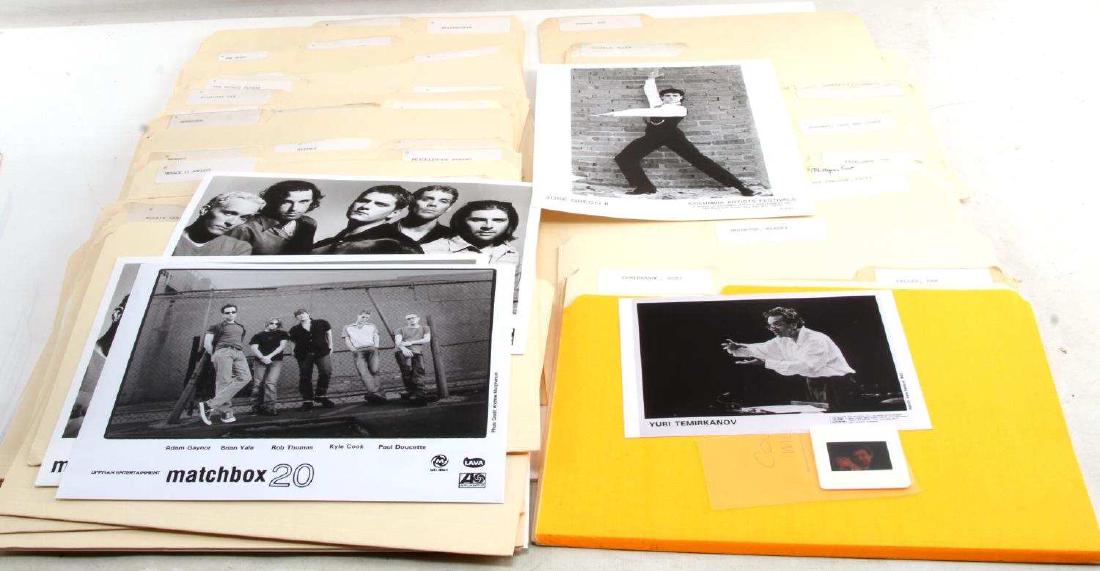 PRESS PHOTO LARGE GROUPING BANDS POLITICIANS: 100+ Press photos which include numerous bands, including but not limited to Journey, Kansas, Matchbox 20, and Marilyn Manson. Also includes some political figures such as Hatian dictator "Baby Doc" D