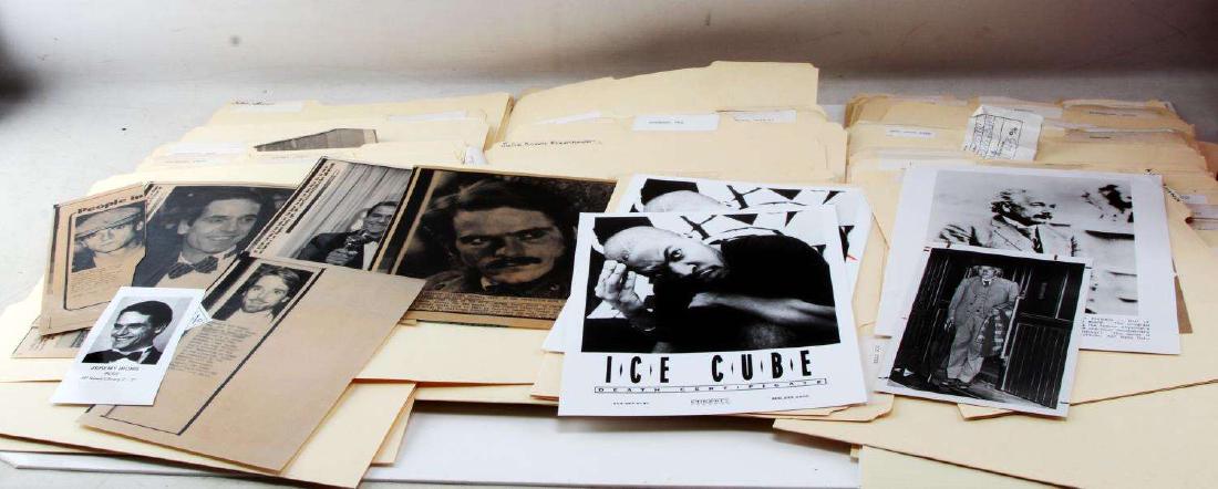 LARGE GROUPING OF PRESS PHOTOS ARTISTS ACTORS: 100+ in group. Includes Charles Durning, K.D. Lang, Bryan Ferry, Eric Idle, Jeremy Irons, and many more. Overall in very good condition with minor bending.