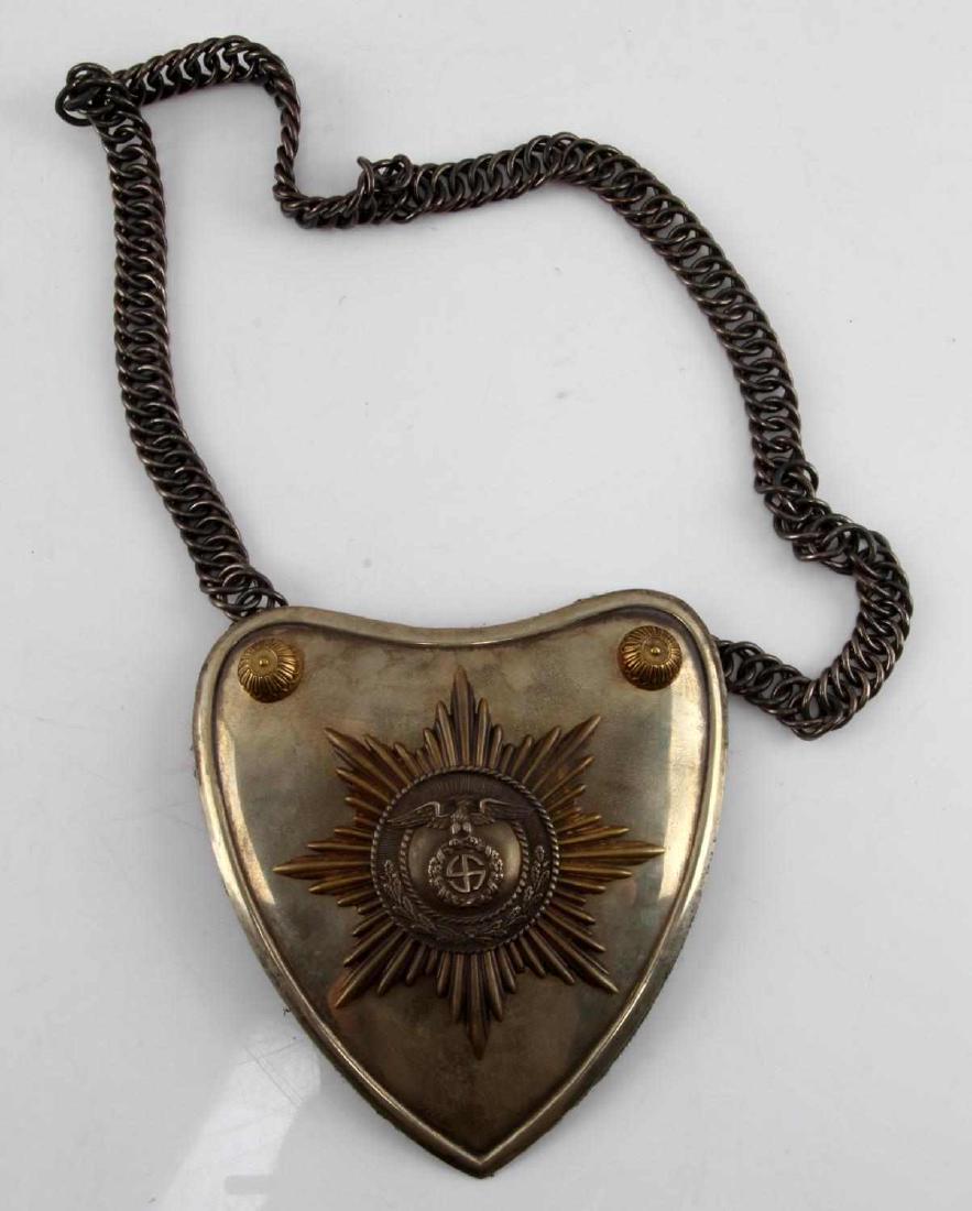 WWII GERMAN THIRD REICH SA STANDARD BEARERS GORGET: Complete with chain in very good condition. Does show signs of age with some discoloration. Felt backing Felt backing with metal RZM 21 control tag. This lot has a reserve.