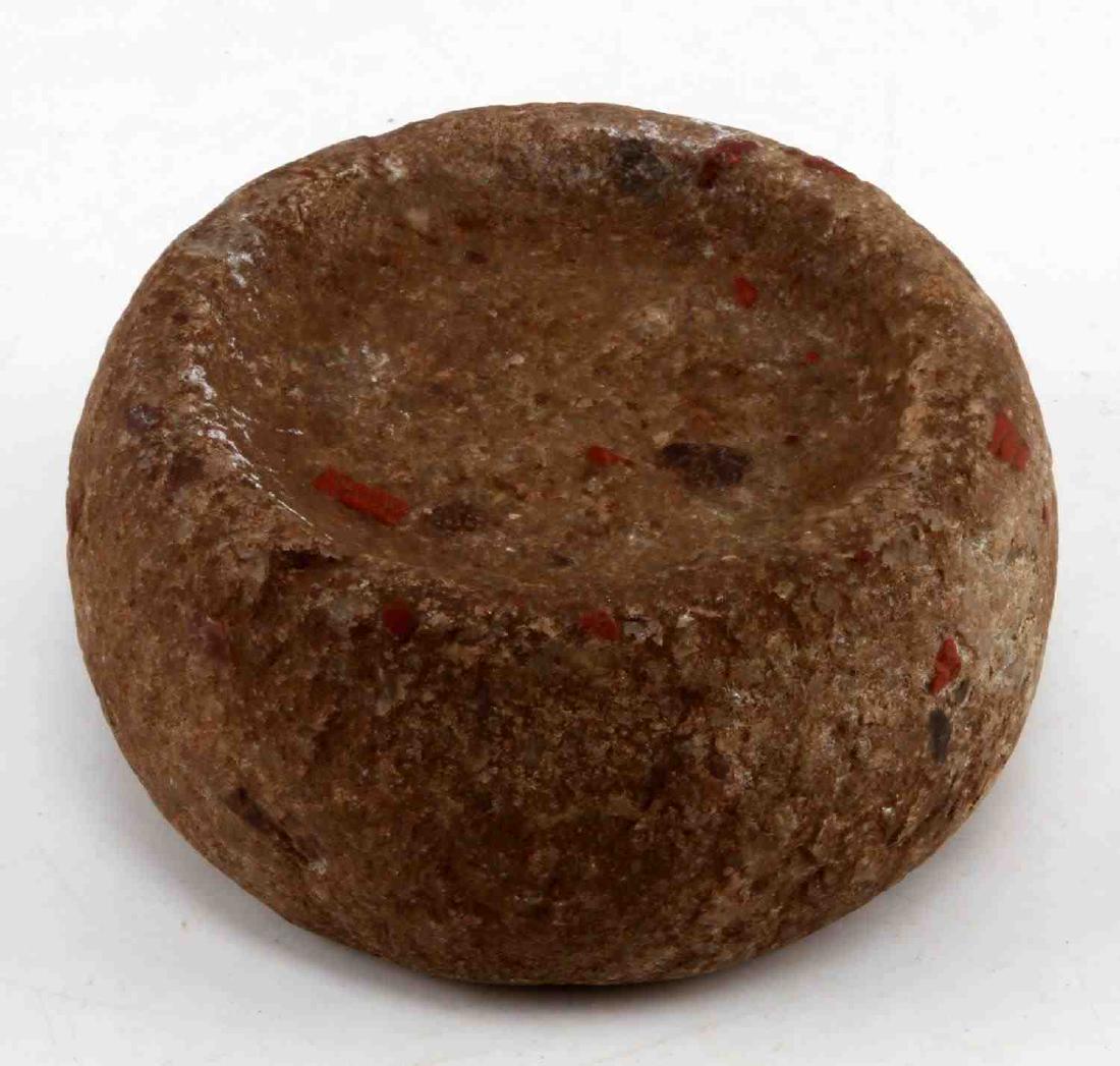 WOODLAND PERIOD STONE DISCOIDAL GAMING PIECE: From a long time Missouri collection, 4 by 2.5 inches.