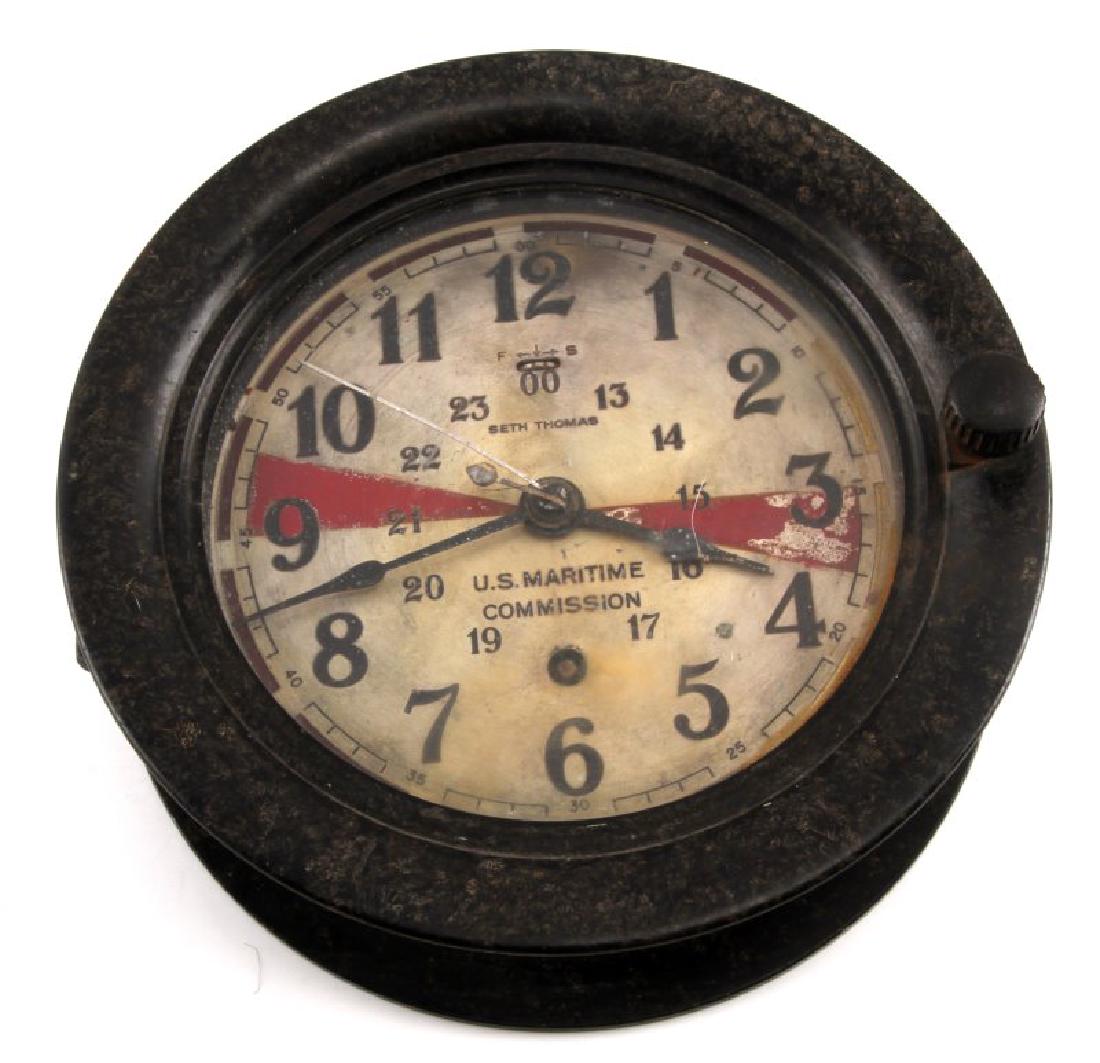 WWII US MARITIME COMMISSION SETH THOMAS SHIP CLOCK: Approximately 7 3/4 inch diameter. Does not appear to be in functioning order. Front window unscrews to expose clock face. Expected moderate age wear/tarnishing.