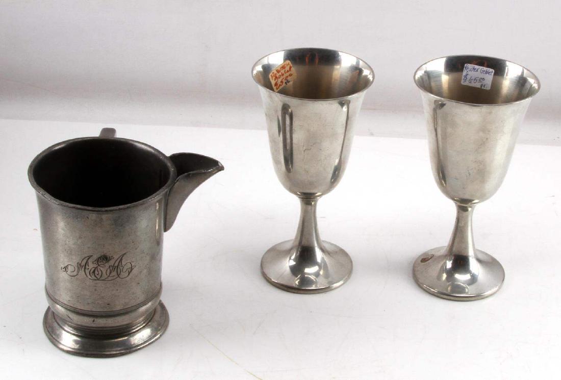 EARLY PEWTER MATCHING GOBLETS AND PINT MUG PITCHER: Lot includes: two shiny goblets (6 5/8 inches tall) by Boardman, and one pint monogrammed mug/pitcher with crown, VR, 67 mark right next to "pint" and engraving to bottom (5 inches tall). Very good co