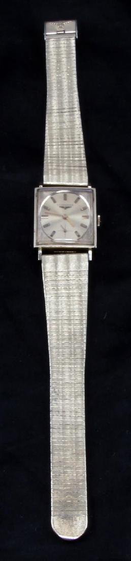 VINTAGE LONGINES 10KT GOLD FILLED UNISEX WATCH: 10KT gold filled 1137-370, 17 jewel unadjusted, 13558178, champagne face 22mm, Kestenmade band. Vintage , used showing appropriate wear, contact marks throughout acrylic face cover.