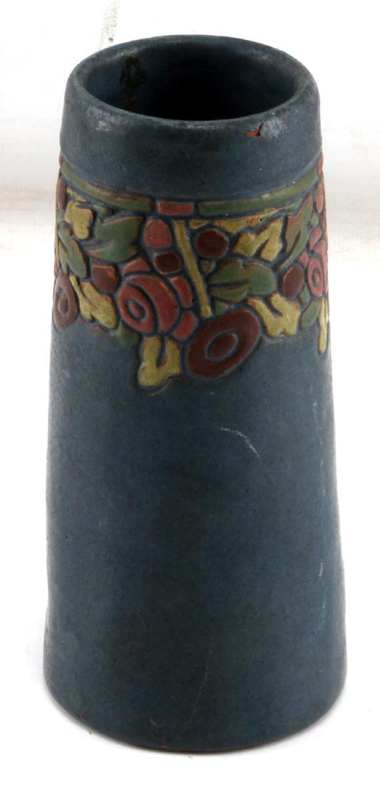 ARTS AND CRAFTS POTTERY VASE W GOOD LUCK SWASTIKA: Hand and made and painted earthenware vase or brush pot with good luck swastika mark on bottom. Measurements 6.5 by 3 inches, 2 hairline fractures 2.5 inches long one from top rim 1 from bottom.