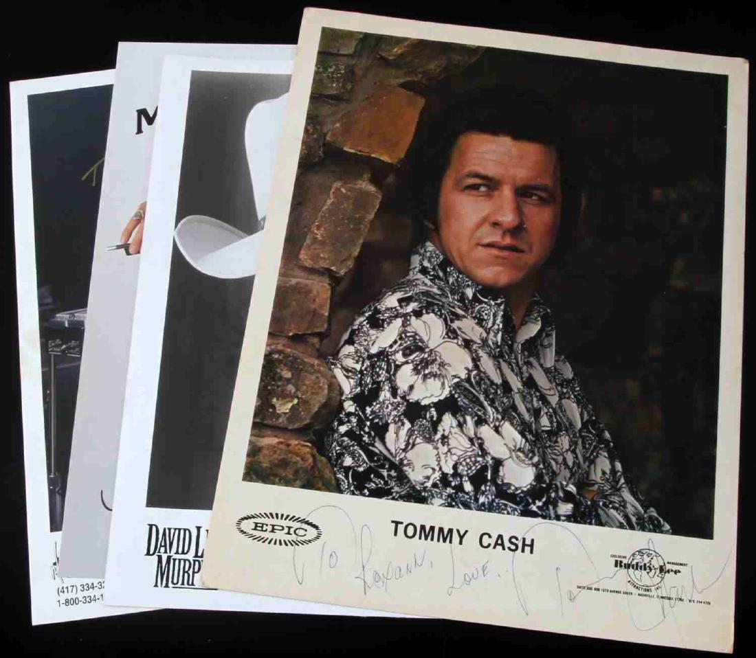 4 AUTOGRAPHED PHOTOGRAPHS MUSICIAN LOT: Includes Tommy Cash, David Lee Murphy, Mike Ito, and Joey Riley Photographs are all 8x10 inch except for Tommy Cash which comes on an 8 1/2 by 11 inch page. No certificates of authenticity present. Ov