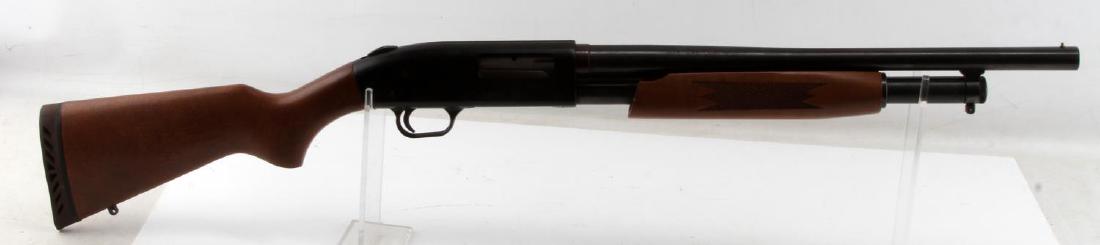 MOSSBERG MODEL 500A 12 GA PUMP ACTION SHOTGUN: Mossberg 500a pump action shotgun. 12 gauge. Has a 18" barrel length. Features rubber butt pad as well as walnut stock and fore grip. Light oxidation on barrel. Good bore. VG condition. Caliber: 12 GA