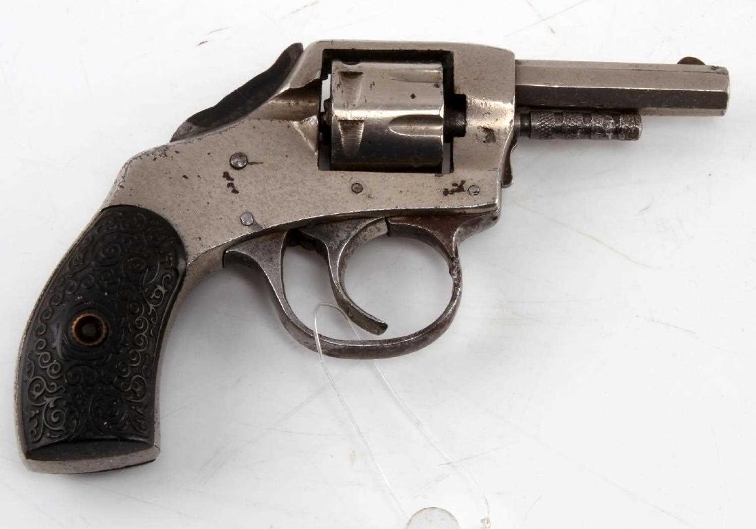 HOPKINS & ALLEN BOSTON BULLDOG .22 PISTOL: Hopkins & Allen Boston Bulldog pistol. Chambered in .22. Lemon squeezer design. Barrel measures 2 1/8". Mild oxidation, fair bore, and a free spinning cylinder, G condition. Caliber: .22 Serial #: nsn