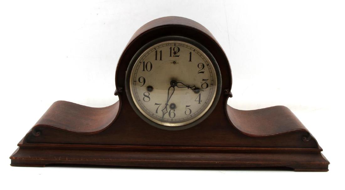 NEW HAVEN CLOCK CO SILENT WOODEN MANTLE CLOCK: Chime Silent, New Haven Clock Company brown wooden exterior mantle clock marked "Chime Silent" inside the dial beneath the 12th dial marker. Items are in good condition with no signs of damage beyond 