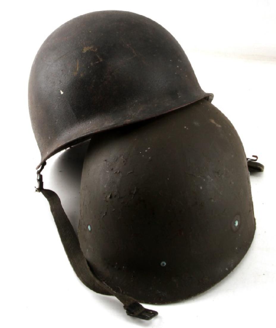 BLACK U.S. M1 POST WWII HELMET WITH LINER & STRAP: US M1 helmet. Post war variant. With liner and strap. Black painted exterior is non-original but still a war time add on based on condition. VG condition.