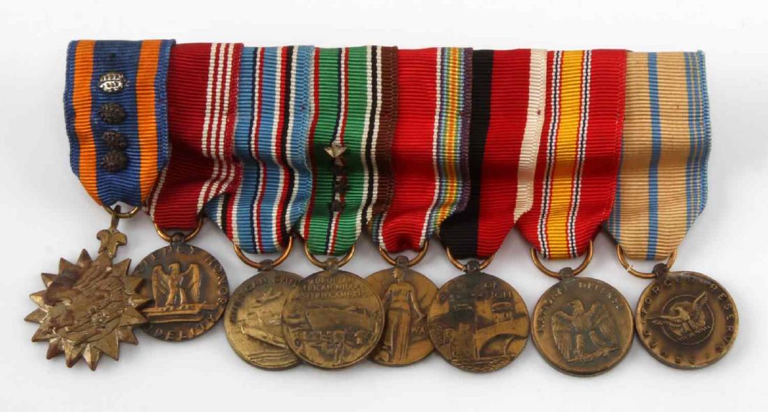 9 US WWII MINIATURE MEDALS NATIONAL DEFENSE MORE: 9 U.S. WWII miniature medals. Includes Armed Forces Reserve, National Defense, Army of Occupation, WWII, European American Middle Eastern Campaign, American Campaign, Good Conduct, and Air Medal. All 