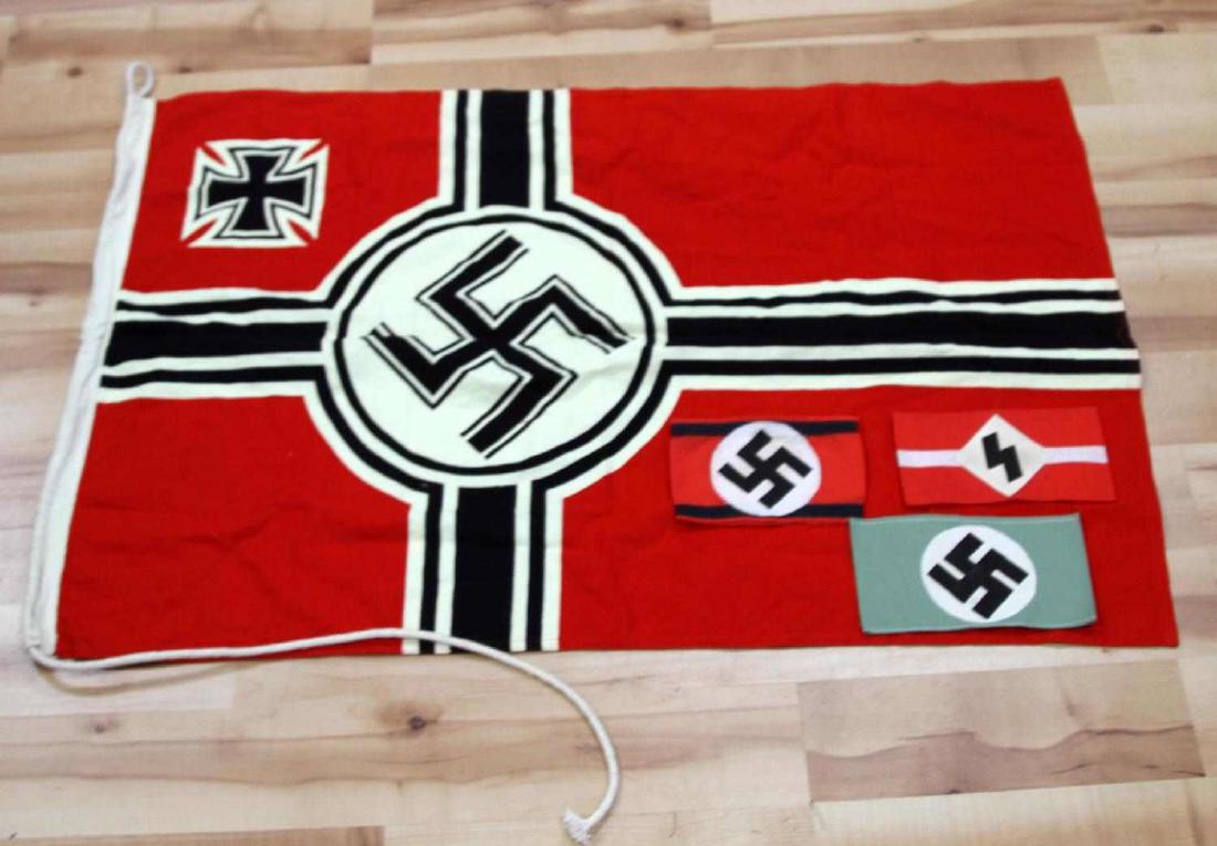WWII GERMAN THIRD REICH ARMBAND AND FLAG LOT: Lot contains three Third Reich armbands and a Kriegsmarine flag. All appear to be modern creations, Armbands include a Hitler Youth style armband with a sig rune instead of a swastika, a black-banded