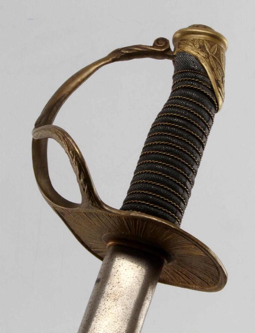US ARMY MODEL 1872 LIGHT CAVALRY SABER W/ SCABBARD: Model 1872 Light Cavalry saber. In very good condition with minor tarnish on the scabbard and hilt. Blade is unsharpened.
