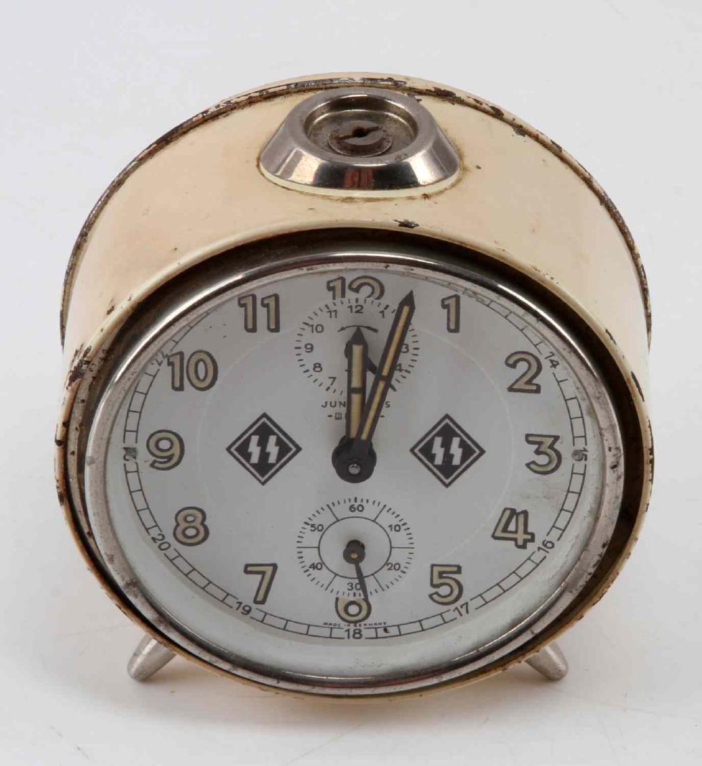 WWII GERMAN THIRD REICH SS ALARM CLOCK: Marked 'Made in Germany' on the back. Face is marked Junghans Bivox. Clock does not run. Minor wear to the paint. In fair condition. Unauthenticated/Sold 'as is. Measures 4 inches in height.