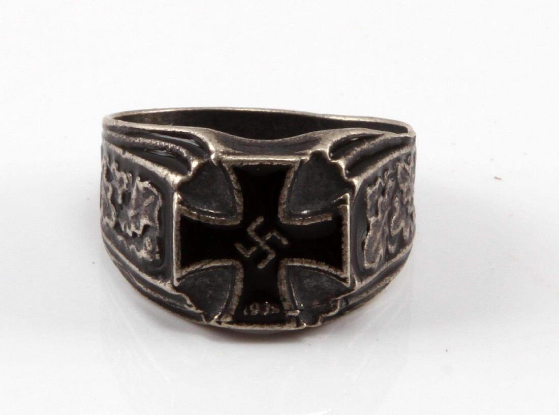 WWII GERMAN THIRD REICH IRON CROSS SILVER RING: Silver ring awarded to some winners of the Iron Cross during WWII. Silver construction weighing 7 grams and sized 11 1/2. Has black enameling. One mark, probably silver '800' mark, on the back of the