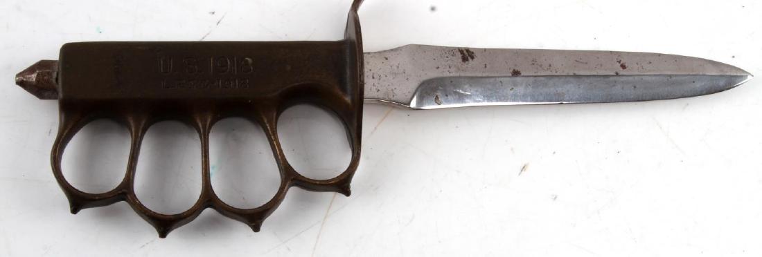 US GOVERNMENT ISSUE M1918 L.F & C TRENCH KNIFE: Knuckle duster finger holds, U.S. 1918 L.F & C-1918 stamped to right side. Blade measures 6 1/8 inches long with little oxidation and one ding. Entire length is 11 inches. EW145