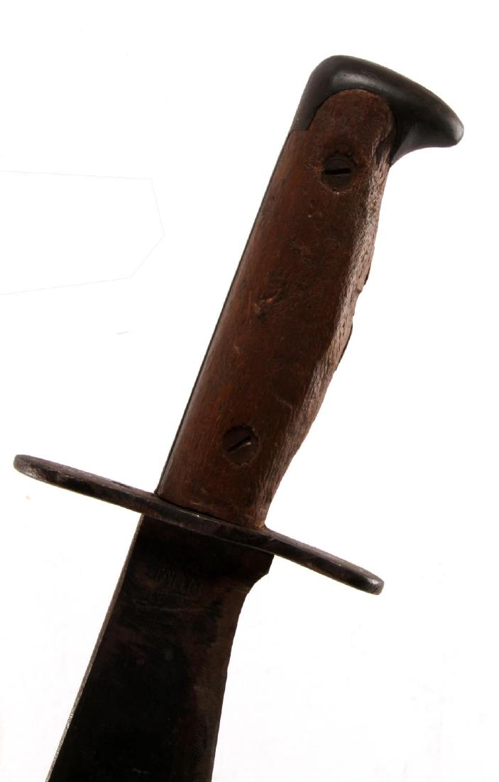LOT OF 4 KNIFE DAGGERS BOLO KA BAR 1918 ENGRAVED: 4 knifes: one aluminum 1918 knuckle, one US M1917 Bolo (Plumb St. Louis), one engraved short sword with bone grip (cracked) and lion's head pommel, and one KA BAR with sheath. Longest measures just un