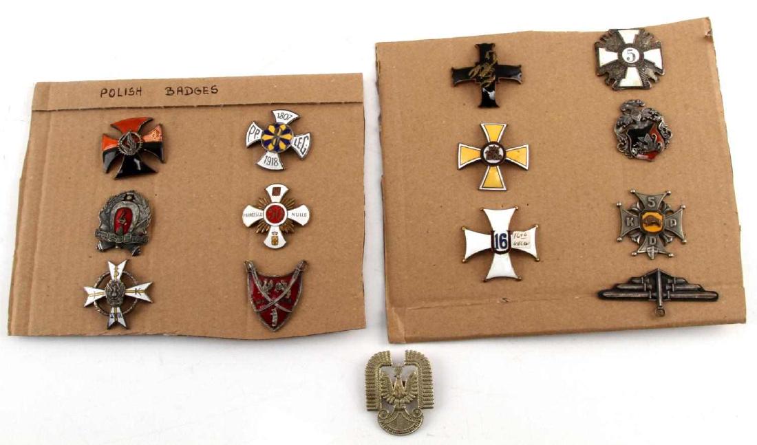 LOT OF 13 POLISH WWII BADGES & MEDALS NAVY AF ARMY: Lot of 13. Includes badges such as 5th Borderlands Infantry Division, Naval Observer Axis, the Air Force Hat Eagle, Army 4th Armored Regiment, Francesco 50 Nullo. All in VG condition.