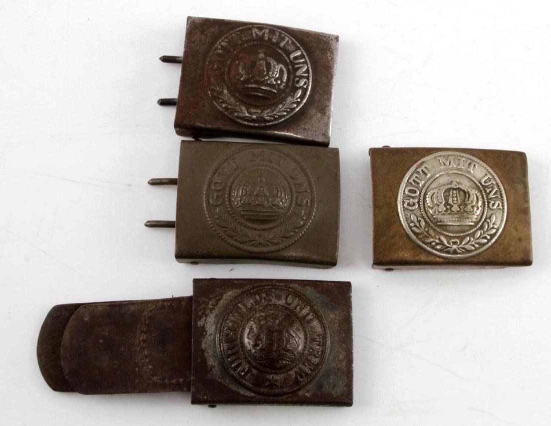 4 WWI IMPERIAL GERMAN GOTT MIT UNS BELT BUCKLE LOT: Lot of FOUR (4). One has part of leather belt attached. One appears to be of brass construction. All in good condition with some tarnish and age wear. #RM16