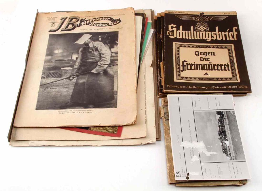 ASSORTED WWII GERMAN PAPER DOCUMENT EPHEMERA LOT: Large lot includes: five (5) issues "Der Schulungsbrief" magazine, one (1) shooting award, one (1) Heer patch/insignia identification poster, one (1) weapon/bullet fold-out poster, two (2) full color 