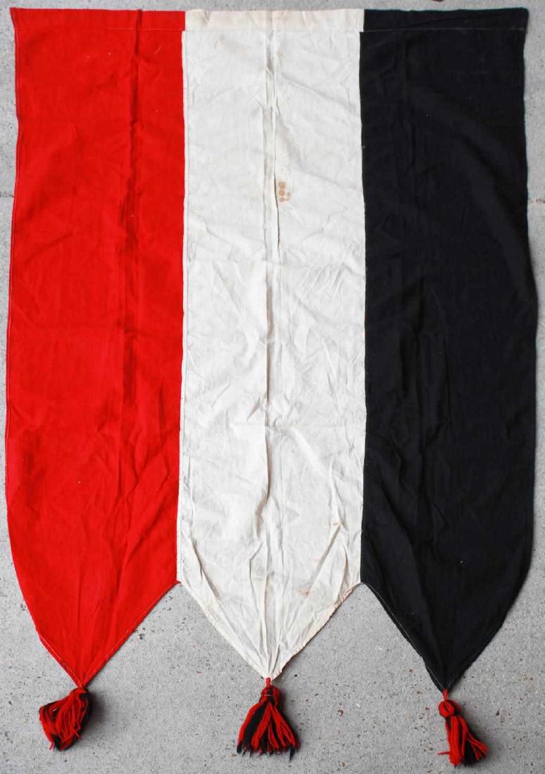 THIRD REICH GERMAN ARMY COMMAND DIVISION FLAG: Red, white, and black flag with tassels on the end, some staining to center, otherwise good condition. Measures 57 X 31 inches. F135