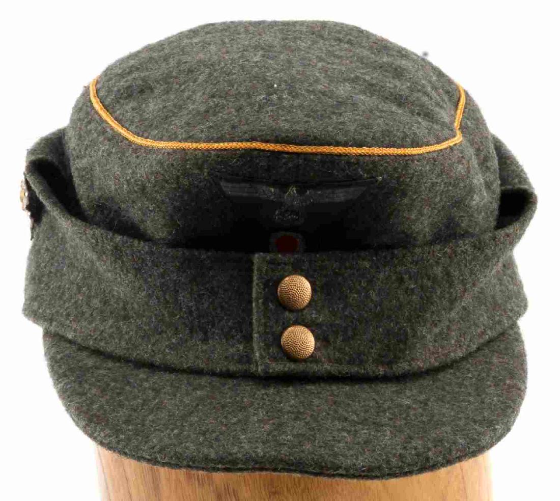 WWII GERMAN THIRD REICH HEER M43 CAP YELLOW PIPING: Yellow piping and Edelweiss mountain troop pin, leather front sweatband has some staining but is intact and good, mothing free. HG120