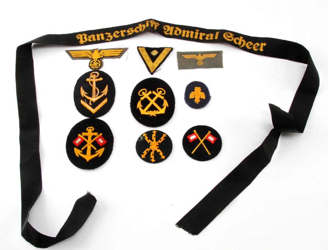 LARGE ASSORTED THIRD REICH PATCHES INSIGNIA LOT: Lot of WWII German Third Reich Heer, Kriegsmarine, Wehrmacht & other patches, cuff titles, and insignias. Lot includes: 4 Kriegsmarine rank patches, two Reichsadler insignias and more. Items are in go