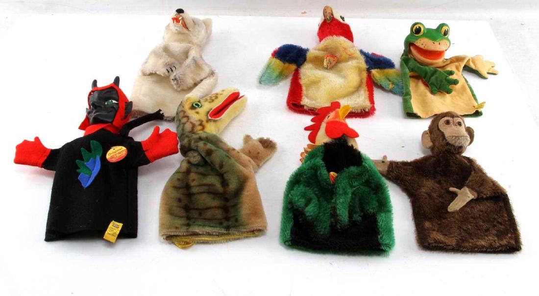 LOT 10 VINTAGE STEIFF ANIMAL HAND PUPPETS GERMAN: Lot includes: cheetah, monkey, parrot, devil, crocodile, rooster, tiger, frog, wolf, and lion. All have Steiff label or button. Lightly used condition.