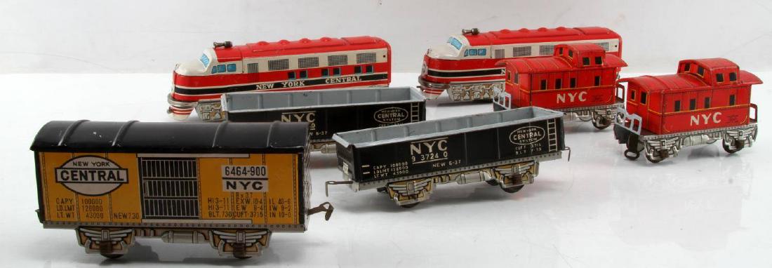 VINTAGE MITO TIN LITO NEW YORK CENTRAL TOY TRAIN: All pieces have moderate play wear with some scratches and or loss (one train car is missing a hub cap).