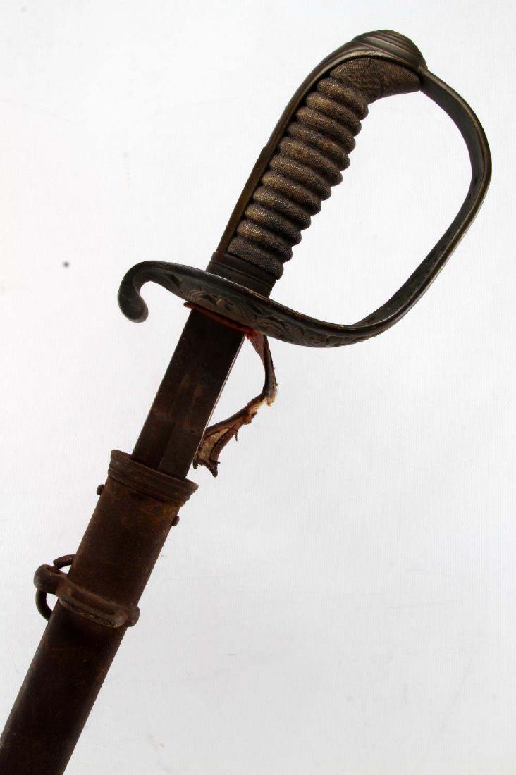 WWI AUSTRIAN M1904 CAVALRY OFFICER DRESS SABER: Model 1904 Austrian Cavalry Officer's saber. Scabbard displays surface corrosion, and the nickel finish is gone. Minor tarnish on the guard. Blade is in good condition. MEW251