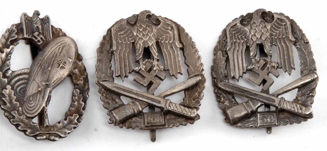 4 WWII GERMAN ARMY BADGE LOT GENERAL ASSAULT ETC: Lot of FOUR (4) includes "General Assault (50 Actions)", "Tank Assault (100 Actions"), "Balloon Pilot", and "General Assault (100 Actions)". Maker's marks on a few. One of the prongs on back has broke